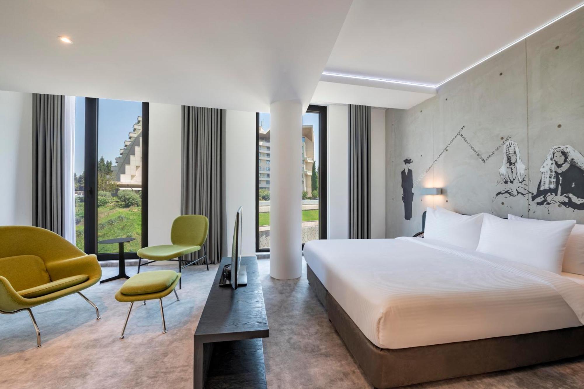 Hotel Golden Tulip Design Tiflis Habitación foto